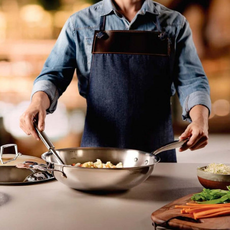 Cocinando con Wok Tramontina de acero inoxidable Grano.