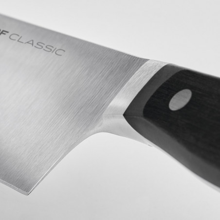 Pormenor do meio reforço da faca de chef Wüsthof Classic, que deixa livre o talão do fio
